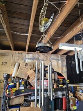 Hanging Metal Wind Chime with Crescent Accent and Amber Orb Solar Power